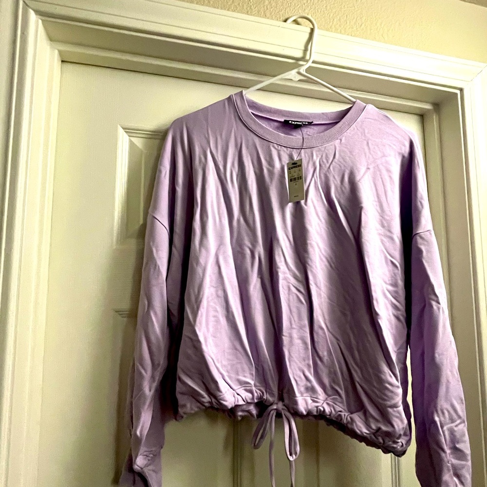 Long sleeve banded bottom sweatshirt. NWT.
